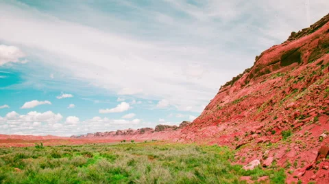 Time Lapse - Cloudscape Moving Over Red Rock Valley Stock Footage 56593465