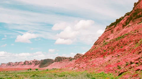 Time Lapse - Cloudscape Moving Over Red Rock Valley Stock Footage 61742178