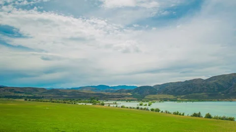 Time Lapse - Cloudscape Moving Over the Lake Video stock 65202000