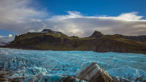 Time Lapse - Cloudscape Moving Over Glacier and Mountains in Iceland Stock Footage 71171711
