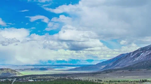 Time Lapse - Cloudscape Moving Over Snowy Mountain Range Video stock 73441942