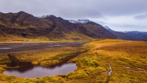 Time Lapse - Cloudscape over Snowcapped Mountains Stock Footage 70574452