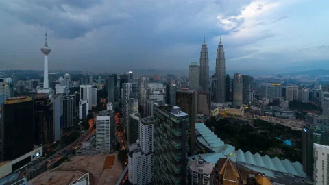 Time lapse: Cloudy and dramatic sunset view of the Kuala Lumpur Stock Footage 196551327
