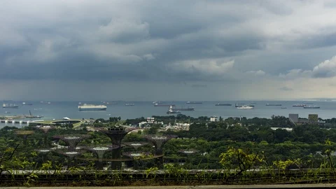 Time-lapse of Cloudy day and moving cloud view at seaside view of Singapore City Stock Footage 100323841
