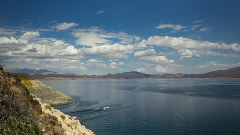 Time Lapse of Cloudy Day with Boats Driving on Lake Stock Footage 107947464