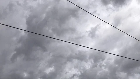 Time lapse of a cloudy gray sky with  power cables Stock-Footage 112350062