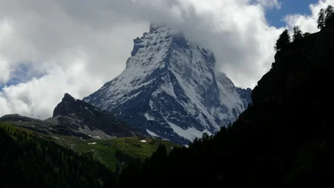 Time lapse Cloudy Matterhorn Roll Up Stock Footage 197655587