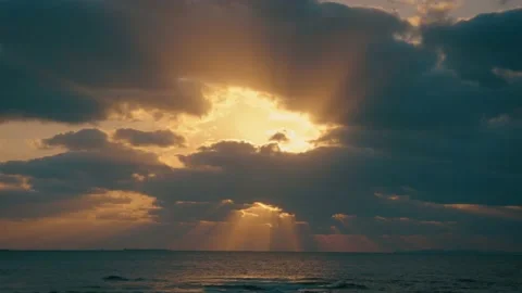 Time lapse Cloudy moving, sun light pass through cloud over the sea Stock Footage 153591439