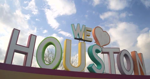 Time lapse of Cloudy Skies Above 'We Love Houston' sign Landmark Stock Footage 303784543