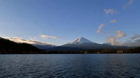 Time lapse of cloudy sky and Fuji mountain at Kawaguchiko lake on sunrise, Japan Stock Footage 100029927