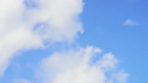 Time-lapse of the cloudy sky. A large white and fluffy cloud. Stock Footage 154721057
