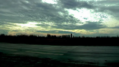 Time Lapse Cloudy Sky Over Wet Road Stock Footage 331589075
