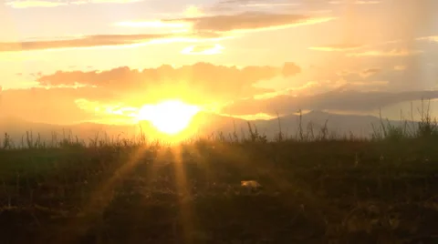 Time Lapse of a Cloudy Sunrise Stock Footage 34174467