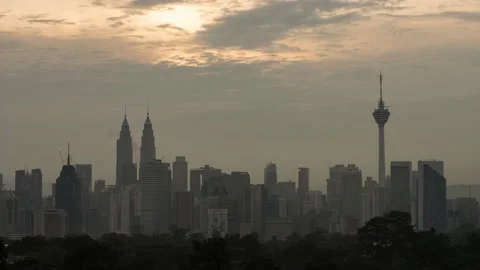 Time lapse of cloudy sunrise Kuala Lumpur view in Kuala Lumpur, Malaysia. Stock Footage 156063040