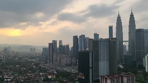 Time lapse of cloudy sunrise in Kuala Lumpur, Malaysia. Stock Footage 240189069