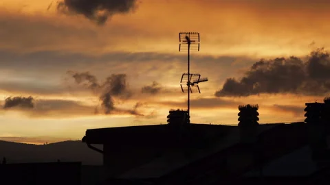 Time lapse: cloudy sunset on cityscape. Silhouette of buildings, nobody present Stock Footage 139592888