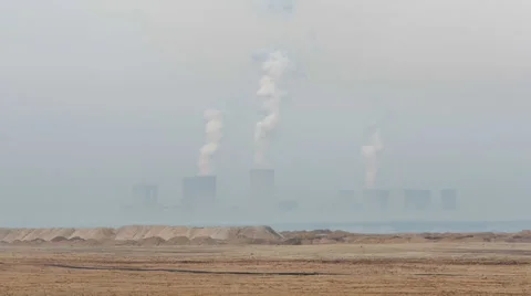 Time-lapse of a coal power plant's cooling towers Stock Footage 65175433