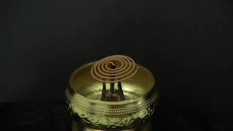 Time Lapse of Coil Incense Burning Stock Footage 269780762