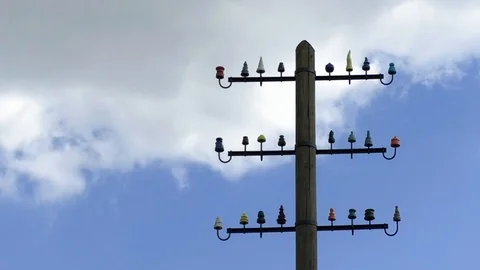 Time lapse: Collection of historic insulators for power lines on old power pole Stock Footage 89305729