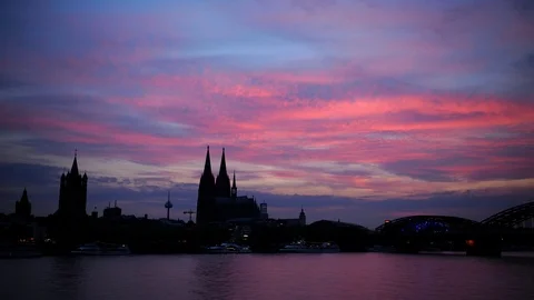 Time Lapse of Cologne Cathedral and St. Martin Church Landmarks Dusk to Night Video stock 96685204