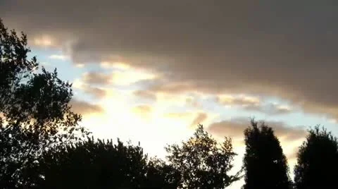 Time-lapse of Colorful Clouds at Dusk Stock Footage