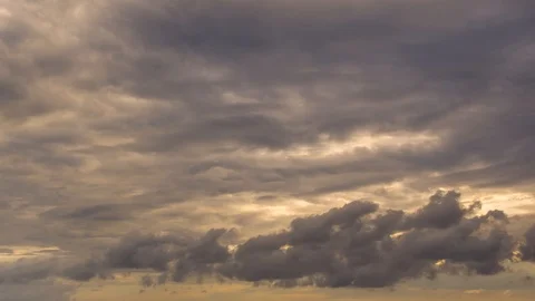 Time lapse colorful clouds moving in different directions Stock Footage 120990389