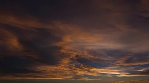 Time lapse of colorful clouds at sunset (1080p 29.97) Stock Footage 68810058