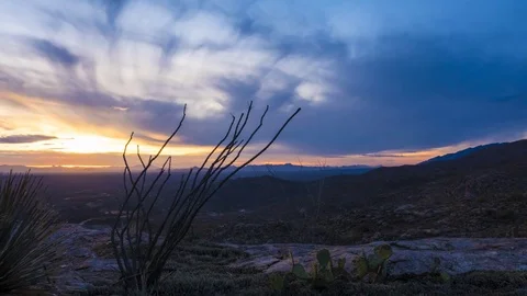 Time lapse of a colorful desert sunset Stock Footage 83960730