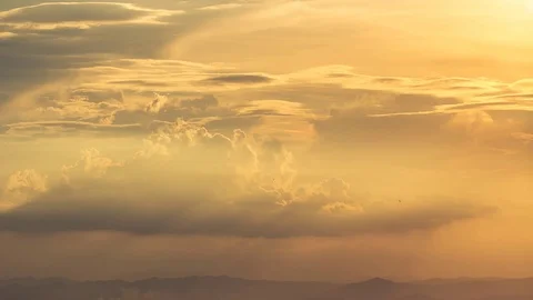 Time Lapse of Colorful dramatic sky with cloud at sunset.Sky with sun background Stock Footage 76505588