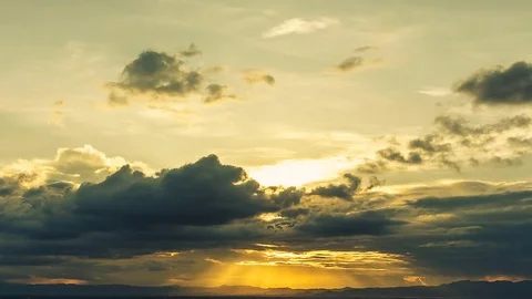 Time Lapse of Colorful dramatic sky with cloud at sunset.Sky with sun background Stock Footage 76506815