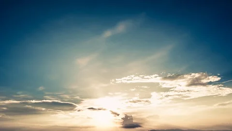 Time Lapse of Colorful dramatic sky with cloud at sunset.Sky with sun background Stock Footage 76506840