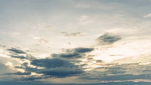 Time Lapse of Colorful dramatic sky with cloud at sunset.Sky with sun background Video stock 76507216