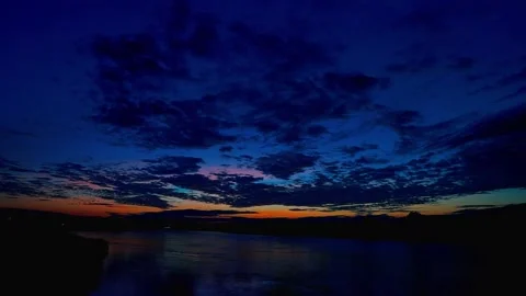 Time-Lapse Colorful sky with cloud in sunset time on the river Stock Footage 164538777
