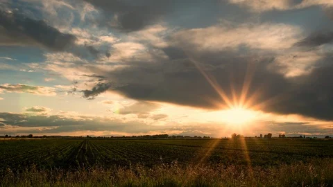 Time lapse of colorful sunset over farm field in Idaho Stock Footage 91462449