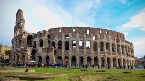 Time lapse of Colosseum, also known as the Flavian Amphitheatre, with moving Stock Footage 80756937