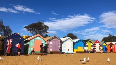Time lapse of colourful bathing boxes at Brighton Beach, Melbourne Stock Footage 113398905