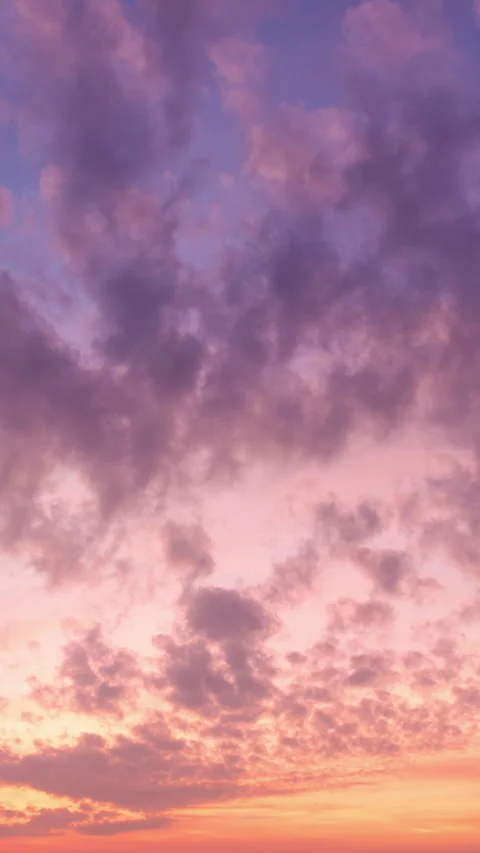 Time lapse of colourful nature clouds moving over clear sky Stock Footage 231241215
