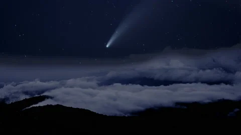 Time lapse of comet passing over mountains and fog Stock Footage 142825535