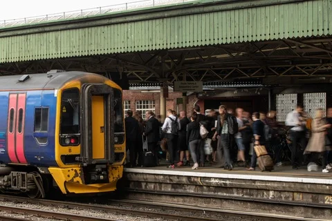 Time-lapse of commuters boarding a train at station Stock Footage 95241004