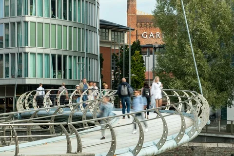 Time-lapse of commuters crossing bridge in Bristol, UK Stock Footage 95241000