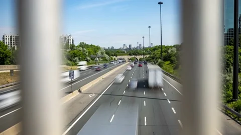Time lapse - Commuters driving on a busy city highway Stock Footage