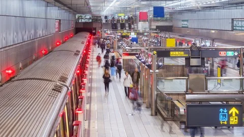 Time lapse of commuters walking and taking MRT during rush hour in Taipei Taiwan Stock Footage 124190577