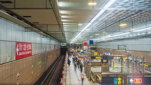 Time lapse of commuters walking and taking MRT during rush hour in Taipei Taiwan Stock Footage 124195179