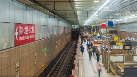 Time lapse of commuters walking and taking MRT during rush hour in Taipei Taiwan Stock Footage 124195427