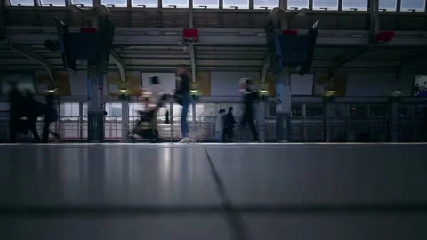 Time lapse of Commuters Walking in Dark railway station, subway train Platform Stock Footage 234957840