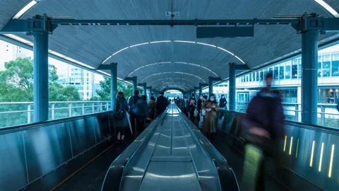 Time Lapse of commuters walking on walkway in Yokohama on a cloudy day, Japan Stock Footage 145504112
