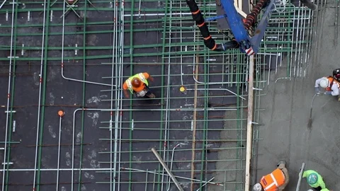 Time Lapse concrete pour with workers Stock Footage 128461936
