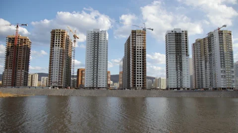 Time lapse of construction of a new district by the river. Stock-Footage 89395204