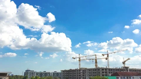 Time lapse of construction site with cranes and blue sky background Stock Footage 43120684