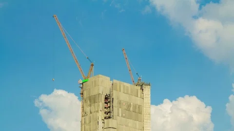 Time lapse construction static crane and clouds move Video stock 96290197